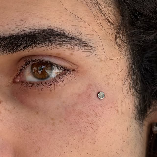 Facial piercing detail